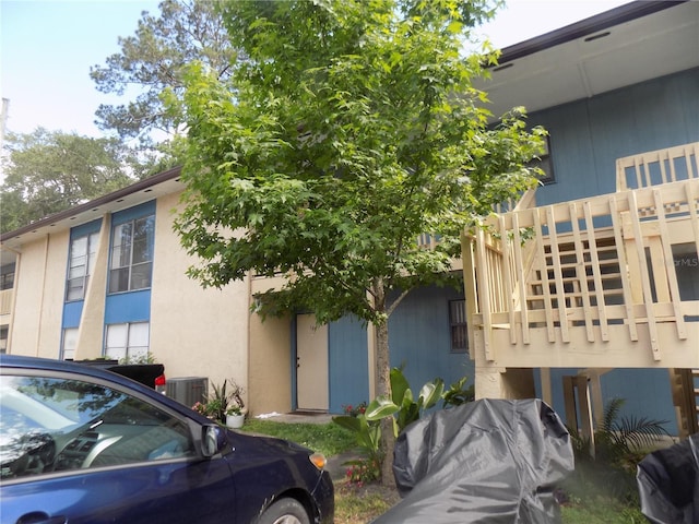 2811 SW Archer Rd Unit W 191, Gainesville, FL 32608 - view of building exterior featuring cooling unit