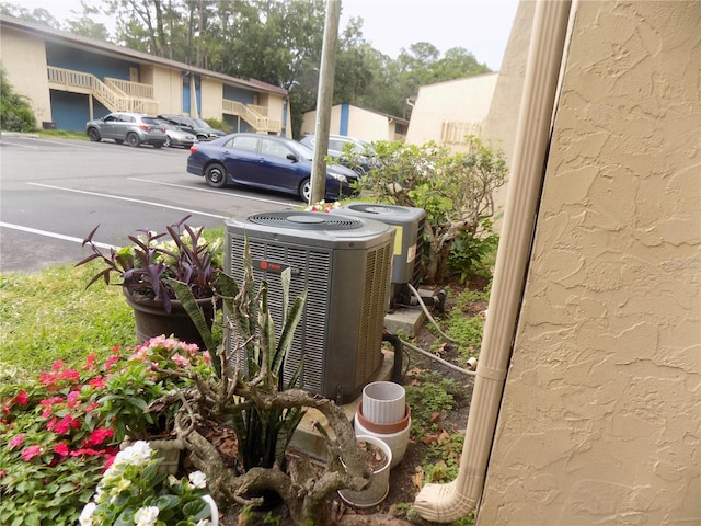 2811 SW Archer Rd Unit W 191, Gainesville, FL 32608 - exterior view of central AC and parking