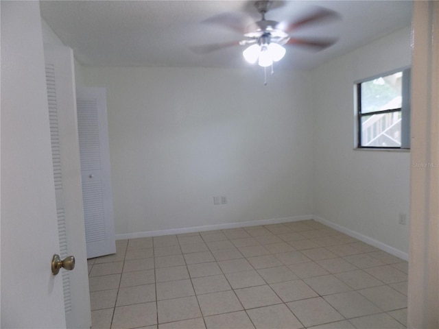 2811 SW Archer Rd Unit W 191, Gainesville, FL 32608 - unfurnished room featuring ceiling fan, light tile patterned floors, and baseboards