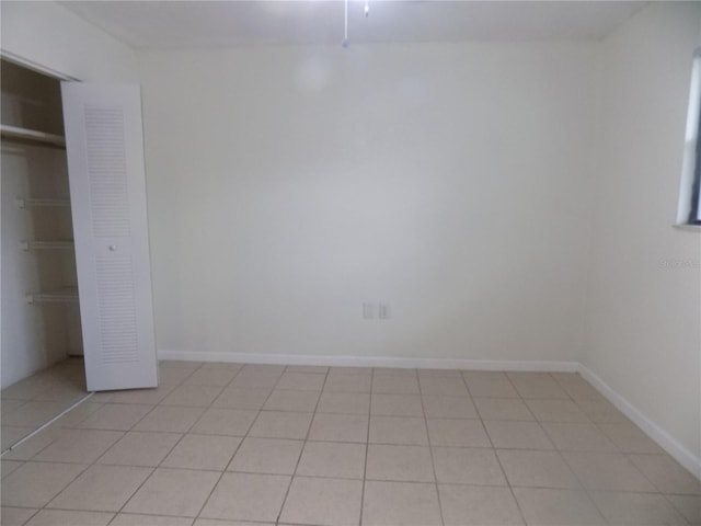 2811 SW Archer Rd Unit W 191, Gainesville, FL 32608 - unfurnished bedroom with a closet and baseboards