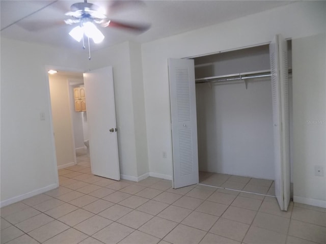 2811 SW Archer Rd Unit W 191, Gainesville, FL 32608 - unfurnished bedroom featuring light tile patterned floors, a closet, and ceiling fan