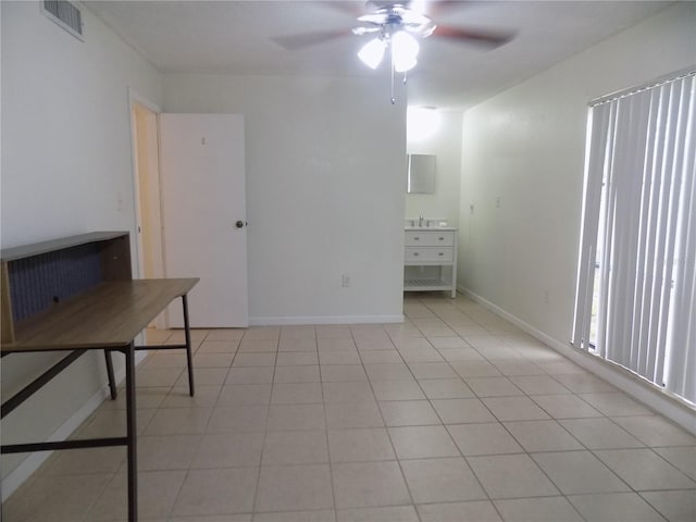 2811 SW Archer Rd Unit W 191, Gainesville, FL 32608 - unfurnished room featuring ceiling fan and baseboards