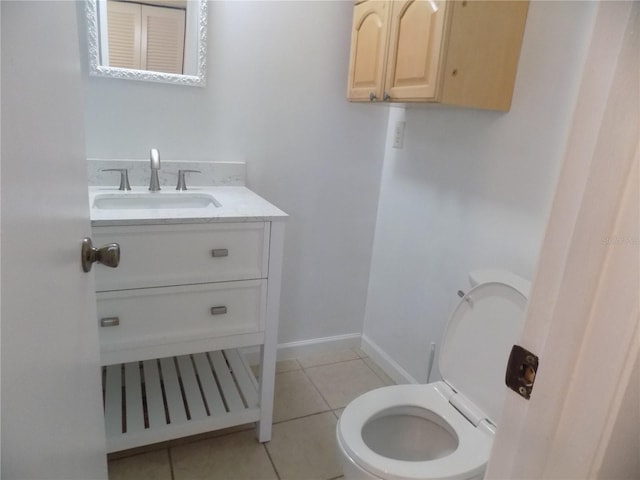 2811 SW Archer Rd Unit W 191, Gainesville, FL 32608 - half bath with tile patterned floors, vanity, and toilet