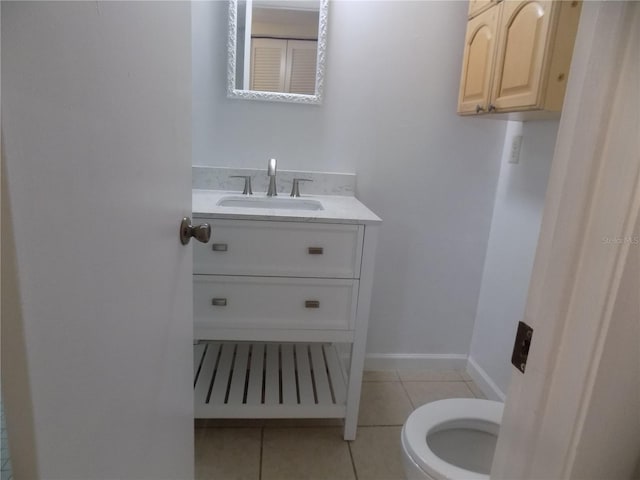 2811 SW Archer Rd Unit W 191, Gainesville, FL 32608 - bathroom featuring tile patterned flooring, vanity, toilet, and baseboards