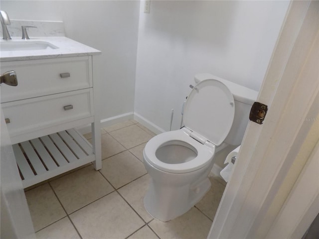 2811 SW Archer Rd Unit W 191, Gainesville, FL 32608 - bathroom featuring tile patterned flooring, toilet, and vanity