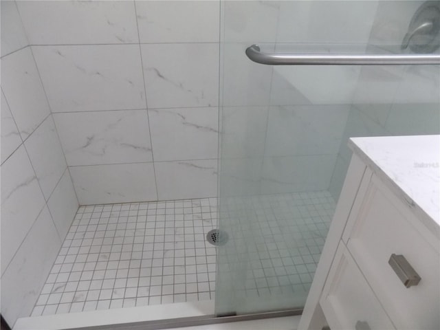 2811 SW Archer Rd Unit W 191, Gainesville, FL 32608 - bathroom featuring tiled shower and vanity