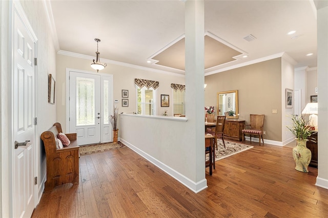 19138 NW 76th Ave, Alachua, FL 32615 - foyer entrance featuring baseboards, recessed lighting, crown molding, and hardwood / wood-style flooring