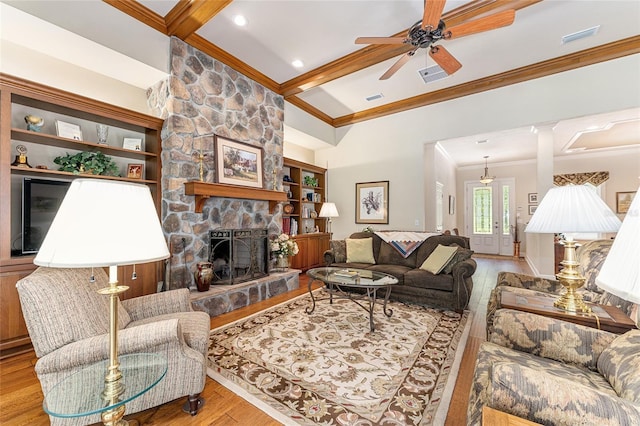 19138 NW 76th Ave, Alachua, FL 32615 - living area with beamed ceiling, visible vents, wood finished floors, and ornamental molding