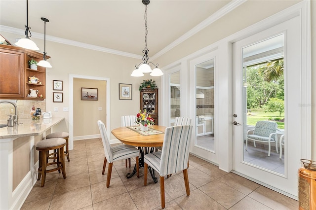 19138 NW 76th Ave, Alachua, FL 32615 - dining area with crown molding, baseboards, and light tile patterned floors