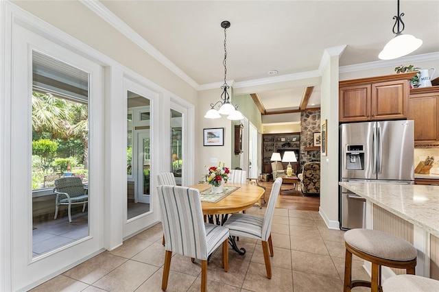 19138 NW 76th Ave, Alachua, FL 32615 - dining area featuring ornamental molding and light tile patterned floors