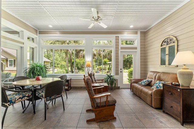 19138 NW 76th Ave, Alachua, FL 32615 - sunroom with wood walls and tile patterned floors