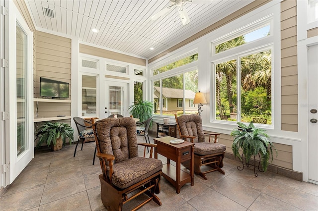 19138 NW 76th Ave, Alachua, FL 32615 - sunroom / solarium featuring a healthy amount of sunlight, ceiling fan, and visible vents