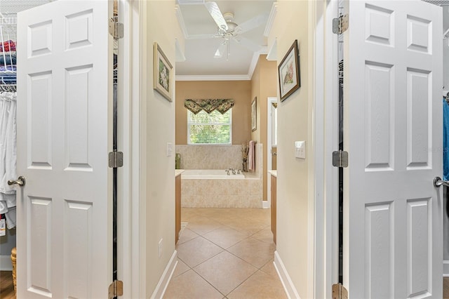 19138 NW 76th Ave, Alachua, FL 32615 - corridor featuring ornamental molding, light tile patterned flooring, and baseboards