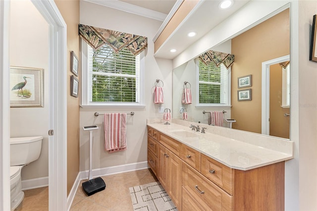 19138 NW 76th Ave, Alachua, FL 32615 - bathroom featuring toilet, tile patterned floors, baseboards, vanity, and ornamental molding