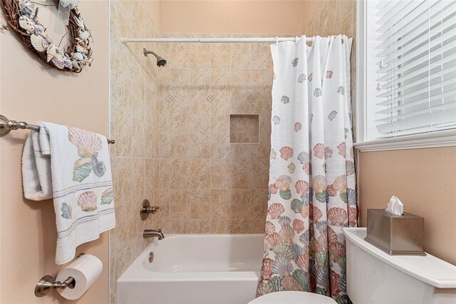 19138 NW 76th Ave, Alachua, FL 32615 - bathroom with toilet and shower / bathtub combination with curtain