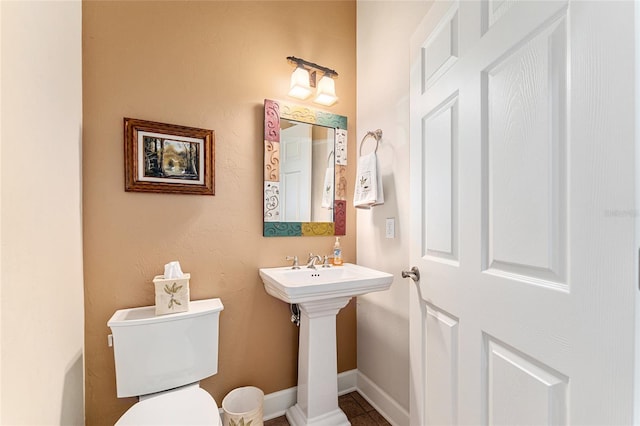 19138 NW 76th Ave, Alachua, FL 32615 - half bath featuring toilet and baseboards