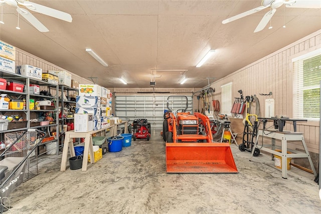 19138 NW 76th Ave, Alachua, FL 32615 - garage featuring wooden walls and a ceiling fan