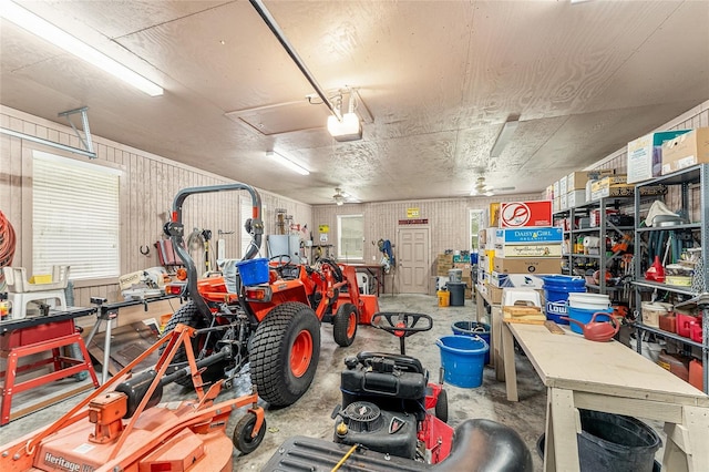 19138 NW 76th Ave, Alachua, FL 32615 - garage with a garage door opener and a workshop area
