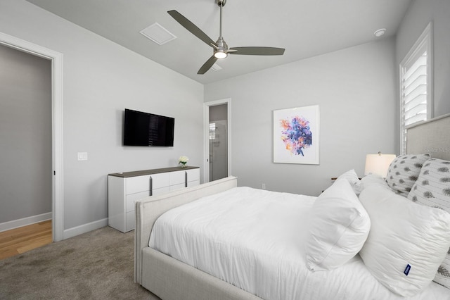 bedroom with carpet, baseboards, and ceiling fan