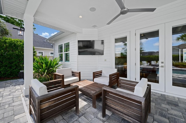 view of patio with french doors, outdoor lounge area, and ceiling fan