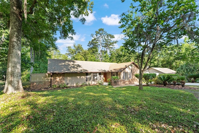 7022 NW 51st Ter, Gainesville, FL 32653 - view of front of property featuring a front yard