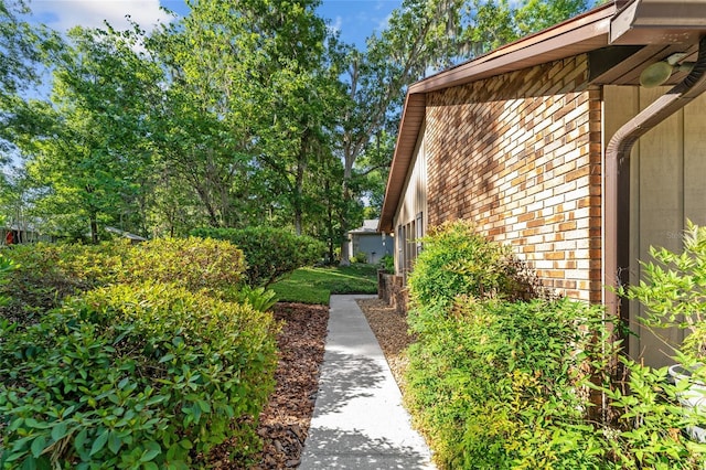 7022 NW 51st Ter, Gainesville, FL 32653 - view of side of home with brick siding