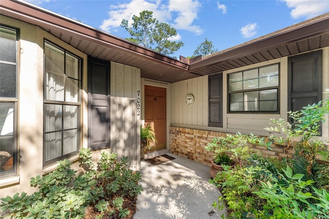 7022 NW 51st Ter, Gainesville, FL 32653 - property entrance featuring brick siding