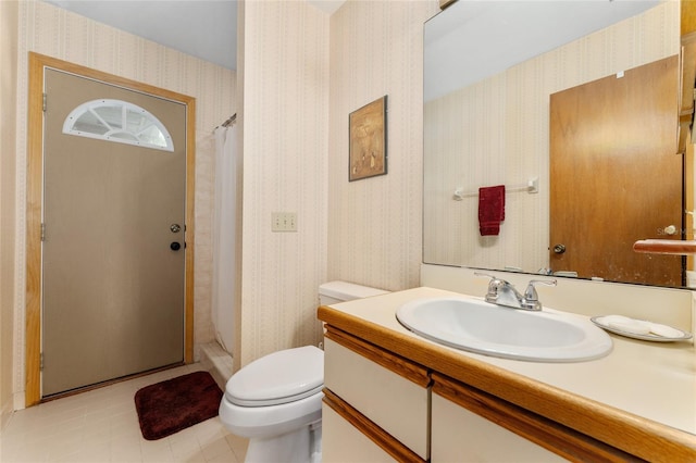 7022 NW 51st Ter, Gainesville, FL 32653 - full bathroom featuring wallpapered walls, toilet, curtained shower, tile patterned floors, and vanity