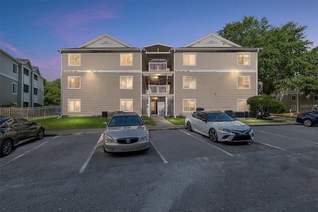 4000 SW 23rd St Unit 2-305, Gainesville, FL 32608 - view of building exterior with uncovered parking