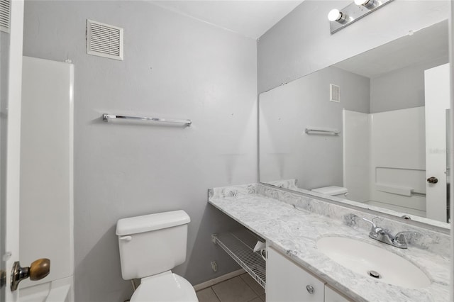 4000 SW 23rd St Unit 2-305, Gainesville, FL 32608 - bathroom with tile patterned flooring, vanity, and a shower