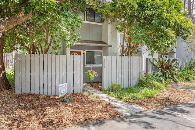 view of property exterior featuring fence