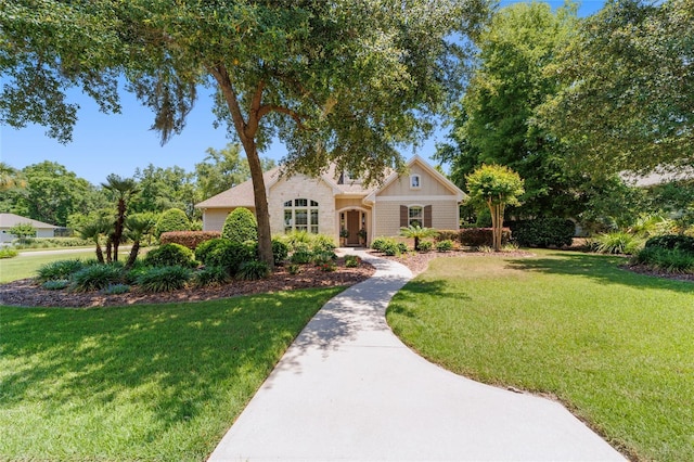 view of front facade with a front lawn