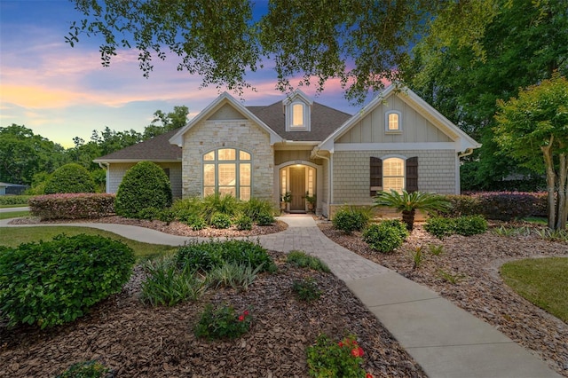 view of front of home with stone siding