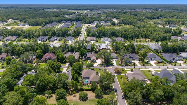 aerial overview of property's location with nearby suburban area