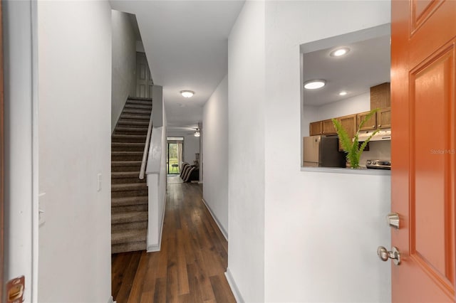 938 NW 42nd Ter, Gainesville, FL 32605 - corridor featuring dark wood finished floors, stairs, and recessed lighting
