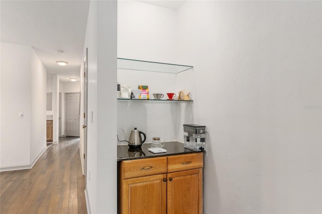 938 NW 42nd Ter, Gainesville, FL 32605 - bar with wood-type flooring and baseboards