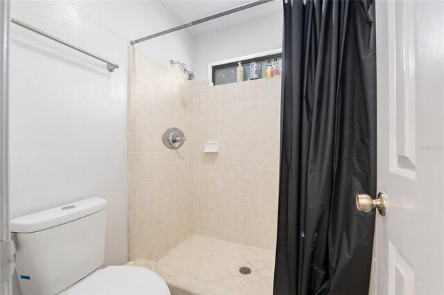 938 NW 42nd Ter, Gainesville, FL 32605 - full bath featuring a shower stall and toilet