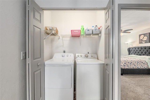 938 NW 42nd Ter, Gainesville, FL 32605 - clothes washing area with washing machine and clothes dryer, carpet floors, and ceiling fan
