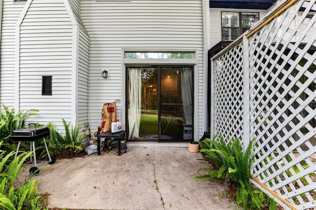 938 NW 42nd Ter, Gainesville, FL 32605 - doorway to property featuring a patio