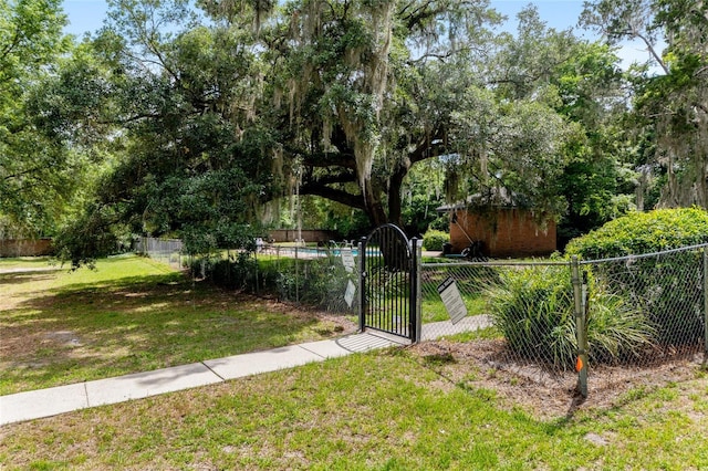 938 NW 42nd Ter, Gainesville, FL 32605 - view of yard with a gate
