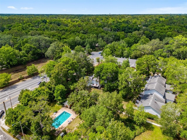 938 NW 42nd Ter, Gainesville, FL 32605 - aerial view of a heavily wooded area and a pool
