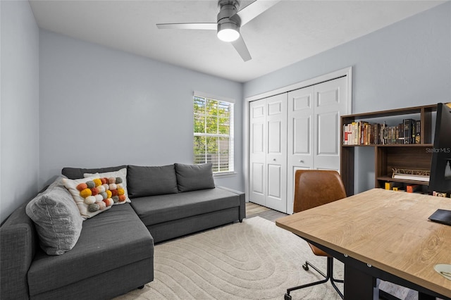 office space featuring a ceiling fan and wood finished floors