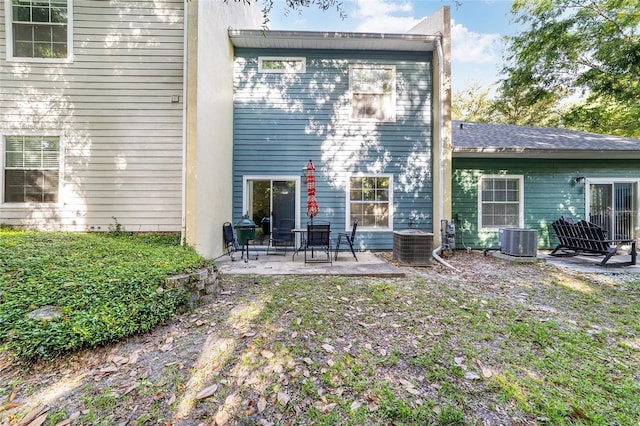 back of house featuring a patio area and central AC