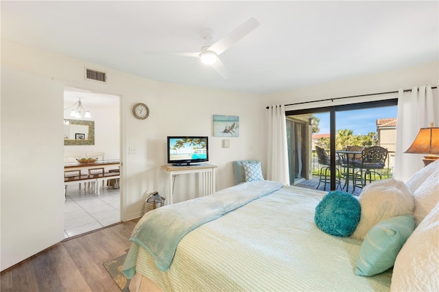 205 Pacifica Vista Way Unit 205, Saint Augustine, FL 32080 - bedroom featuring ceiling fan, access to outside, visible vents, and wood finished floors