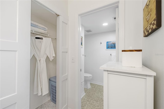 205 Pacifica Vista Way Unit 205, Saint Augustine, FL 32080 - bathroom featuring toilet, baseboards, and visible vents