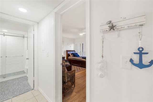 205 Pacifica Vista Way Unit 205, Saint Augustine, FL 32080 - ensuite bathroom with tile patterned flooring, ensuite bathroom, a shower stall, and baseboards