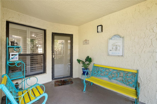 205 Pacifica Vista Way Unit 205, Saint Augustine, FL 32080 - view of exterior entry featuring stucco siding