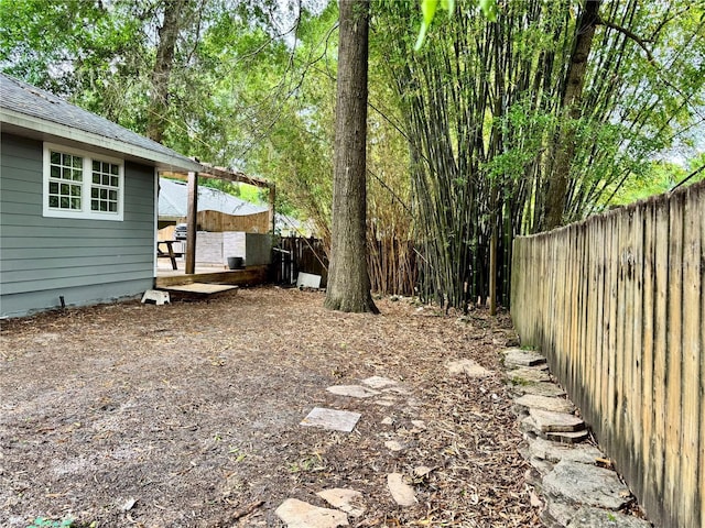 view of yard with fence