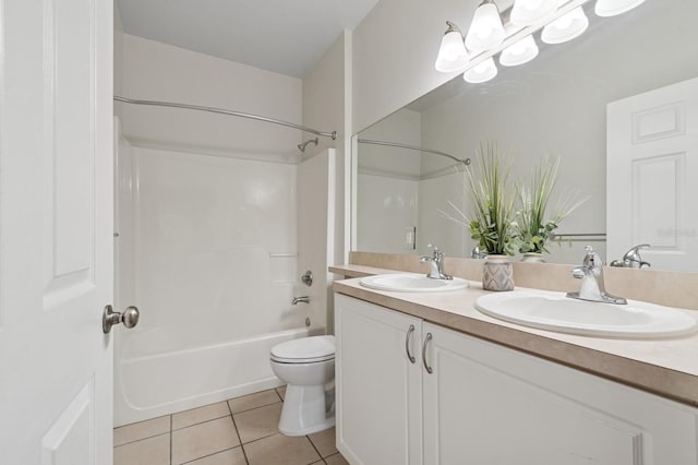 full bath with tile patterned flooring, toilet, shower / washtub combination, and double vanity