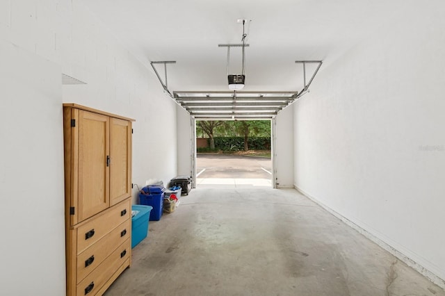 garage featuring a garage door opener